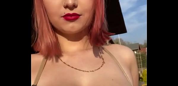  18 YEAR OLD WOMAN SHOWS TITS OUTDOORS